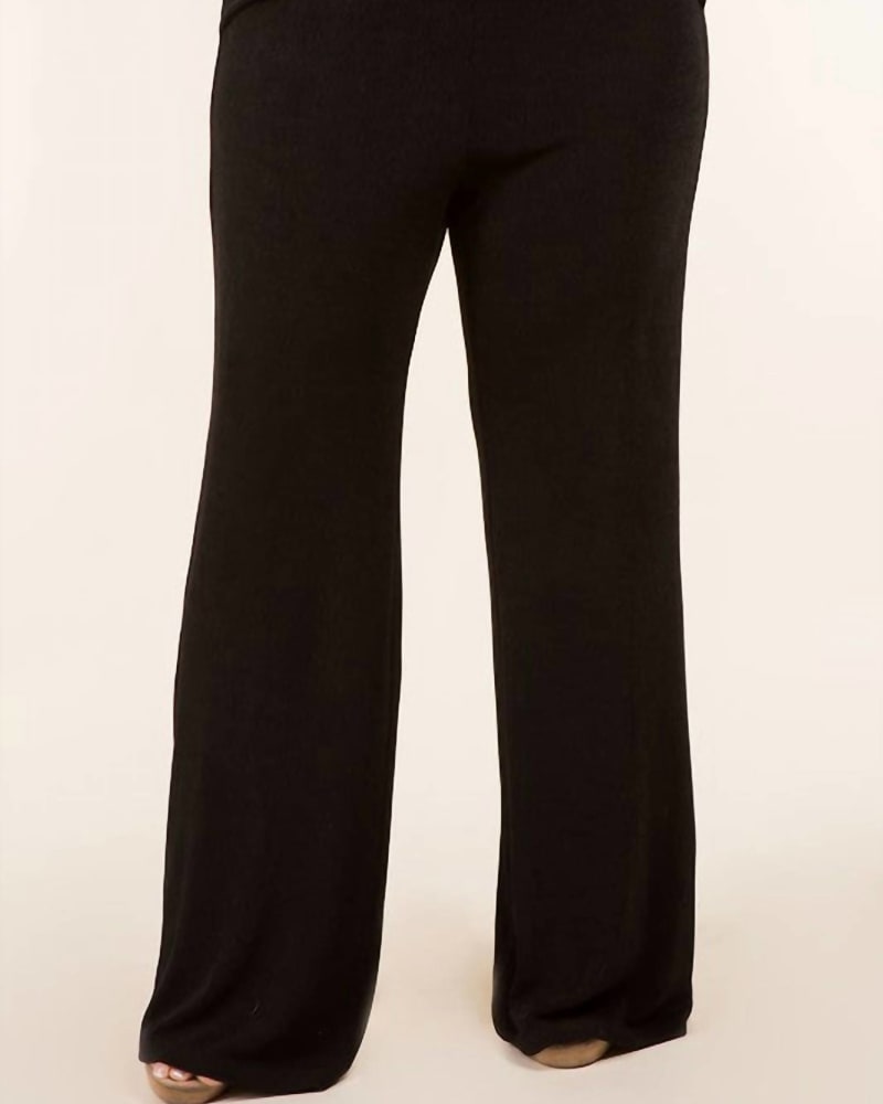 Front of a model wearing a size 2XL Plus Drape Knot Detailed Slinky Wide Pants in Black in Black by Let's go Uptown. | dia_product_style_image_id:343594